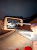 8 Gently Hold Up Black Fixture With Small Screwdriver to Enable Insertion of Small Spring.jpg